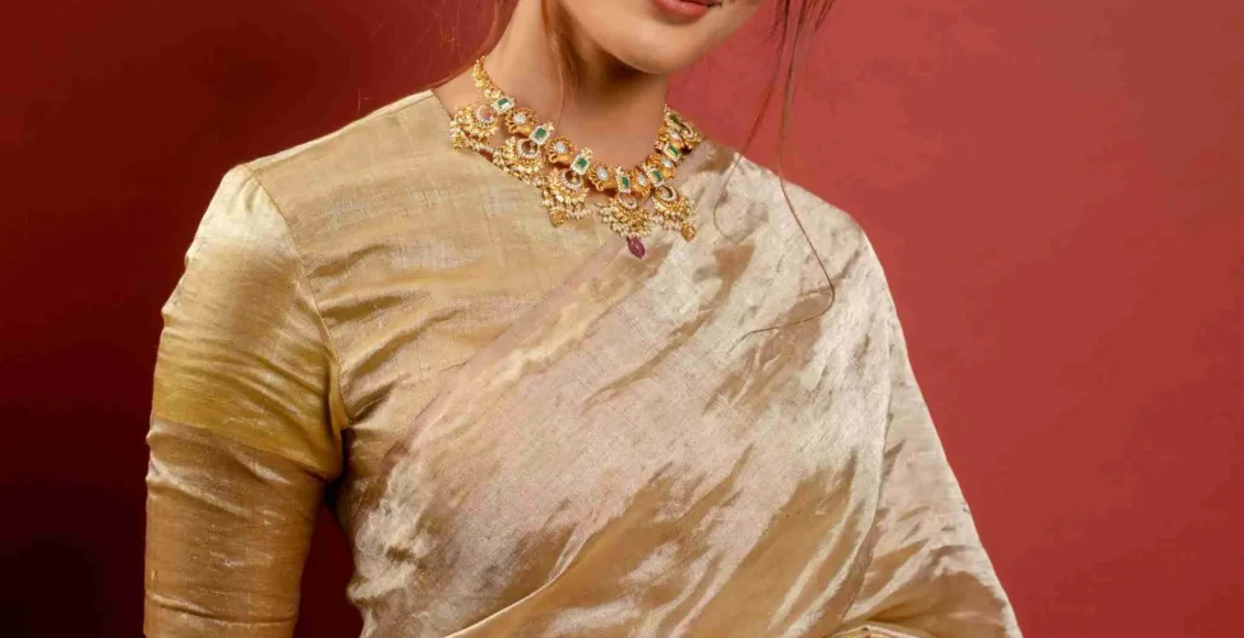 Actress-Pooja-Hegde-New-HD-Stills-in-a-Golden-Saree–scaled